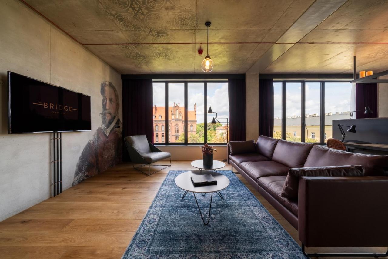 The Bridge Wroclaw - Mgallery Exteriör bild A living room at Bridge on Main